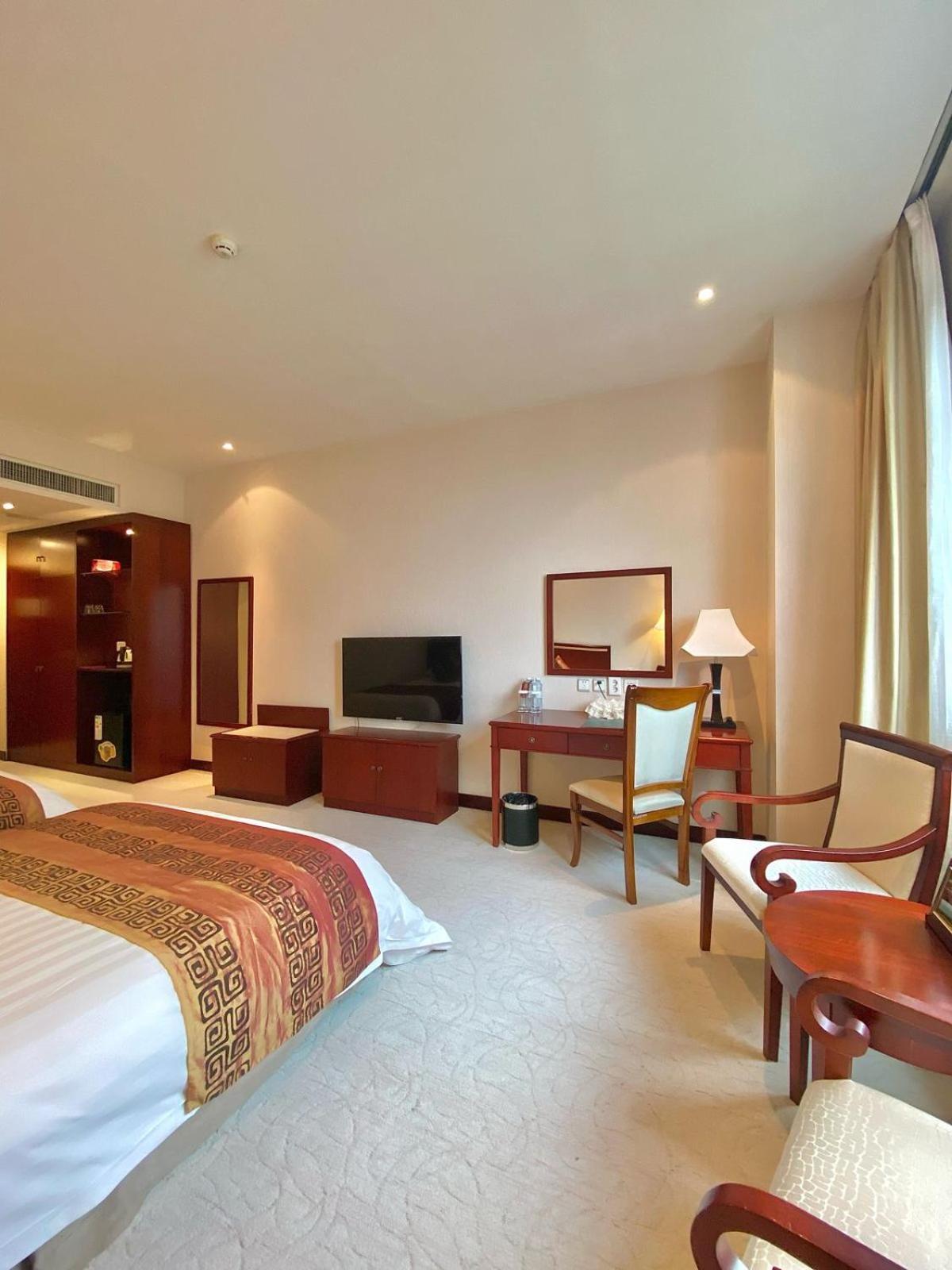 Beijing Palace Soluxe Hotel Astana Exterior photo A room at the hotel