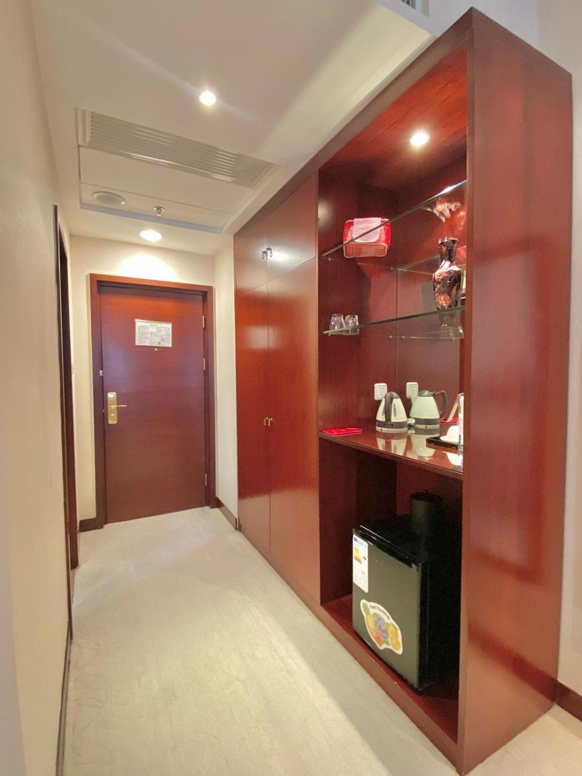 Beijing Palace Soluxe Hotel Astana Exterior photo A wet bar in a hotel room